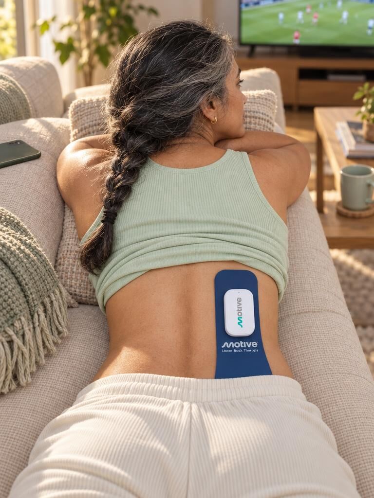 Woman on the couch during a Motive session