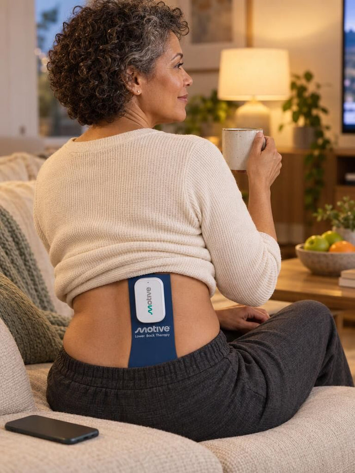 Woman seated at home between sessions