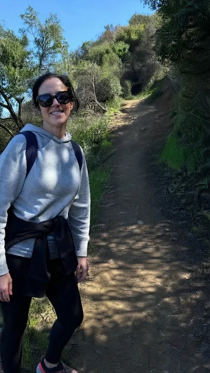 Customer hiking on a trail
